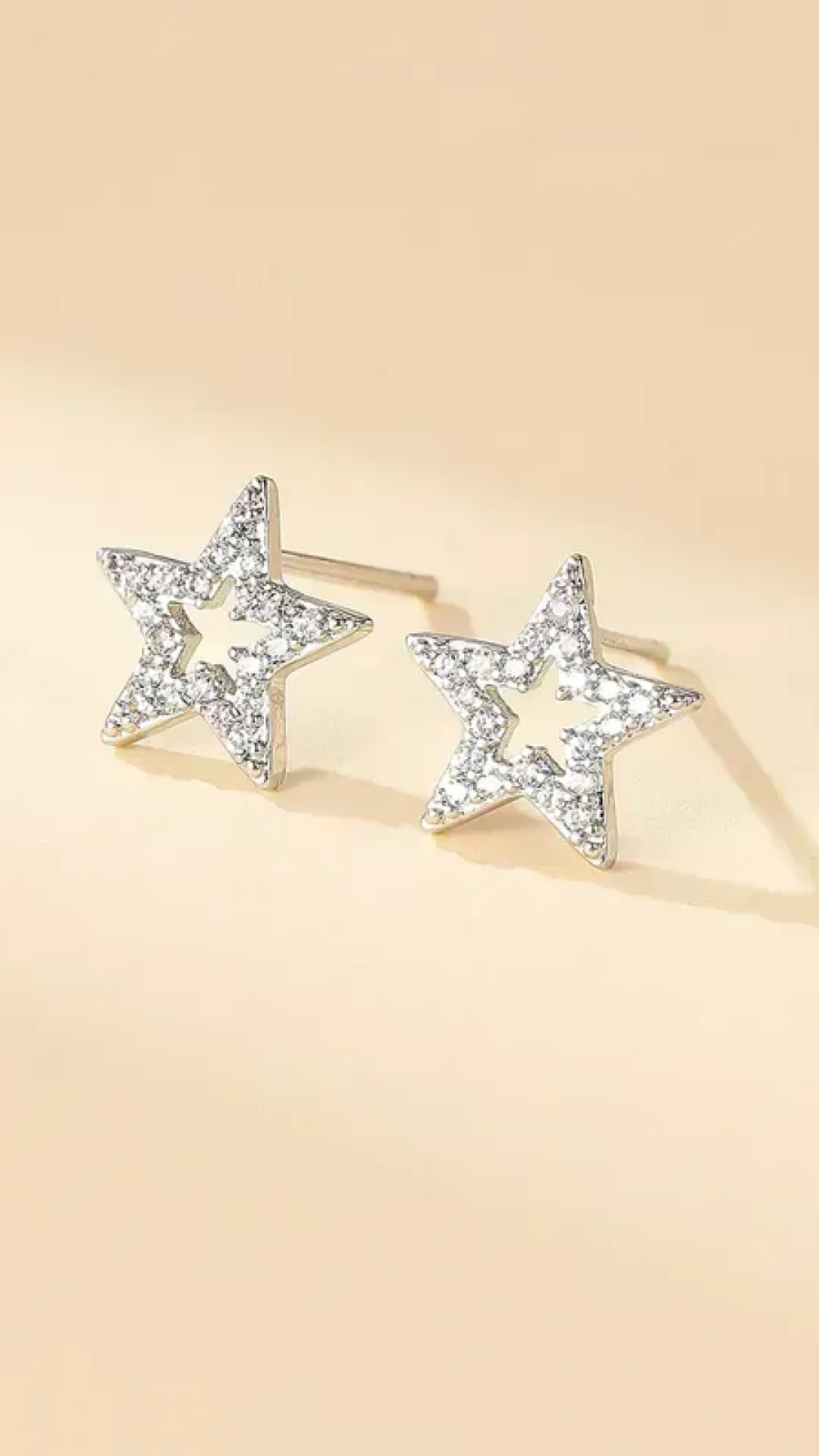 Pendientes estrella color plata