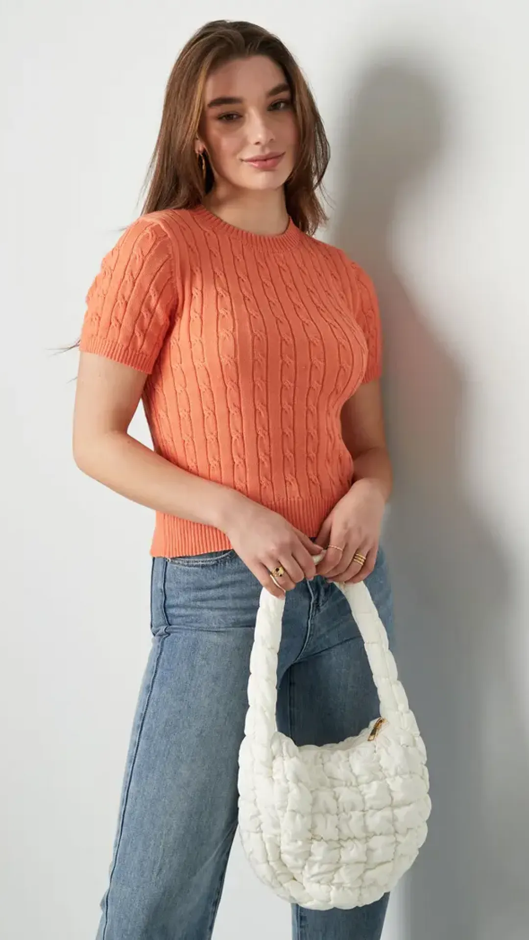 Jersey de punto con trenzas y manga corta naranja