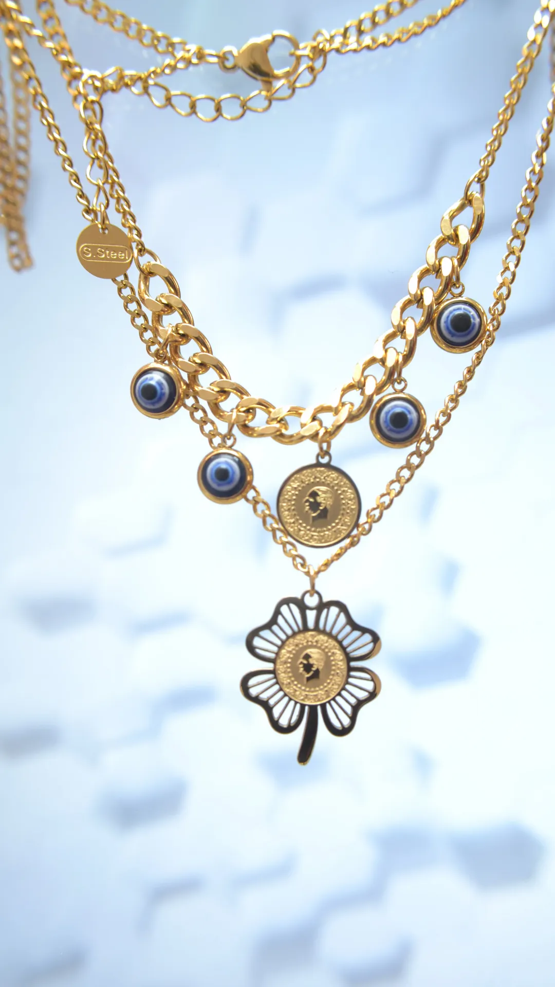 Collar de flor con ojo turco de acero inoxidable enchapado en oro de 18k