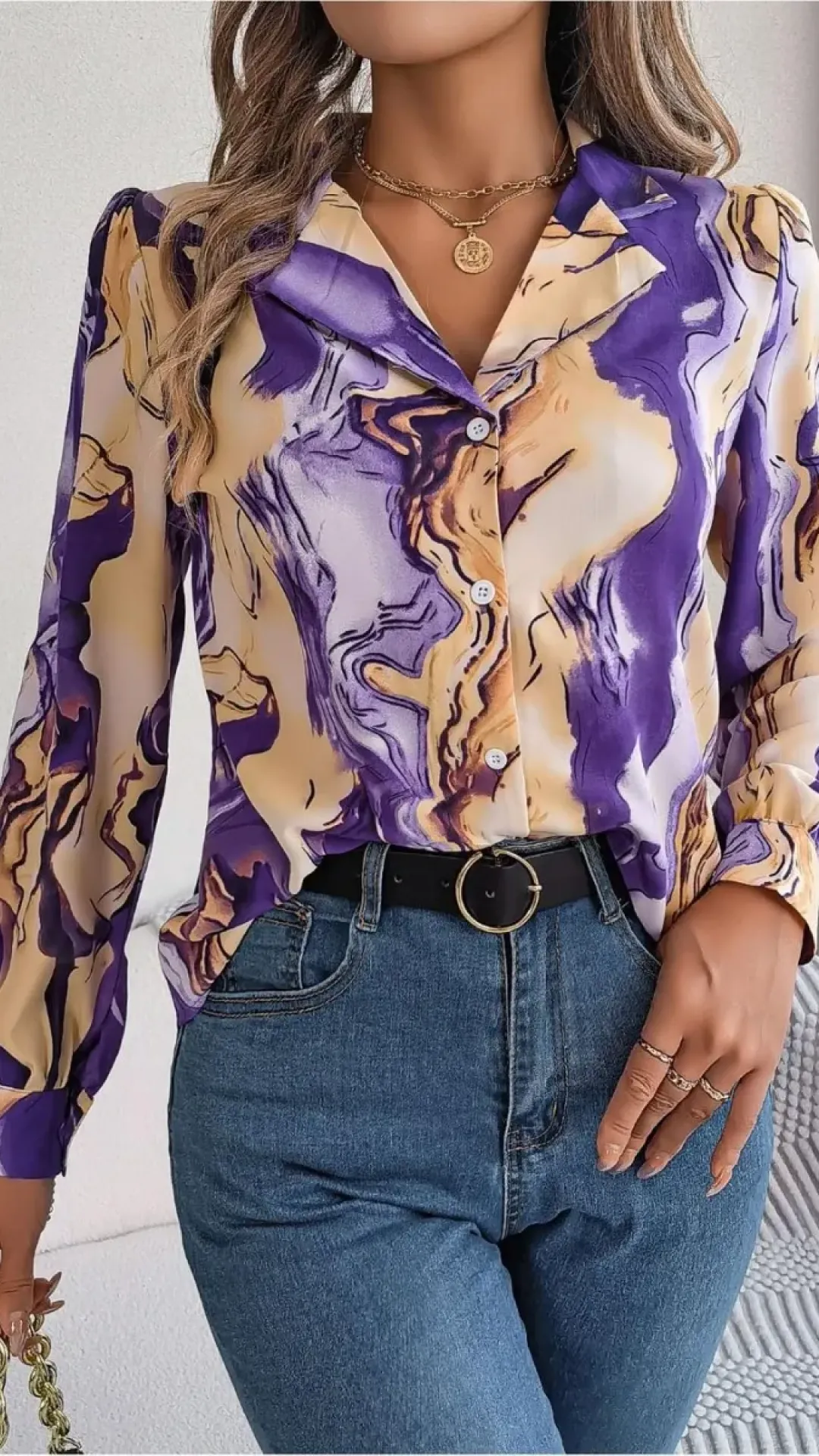 Blusa de manga larga con botones y estampado