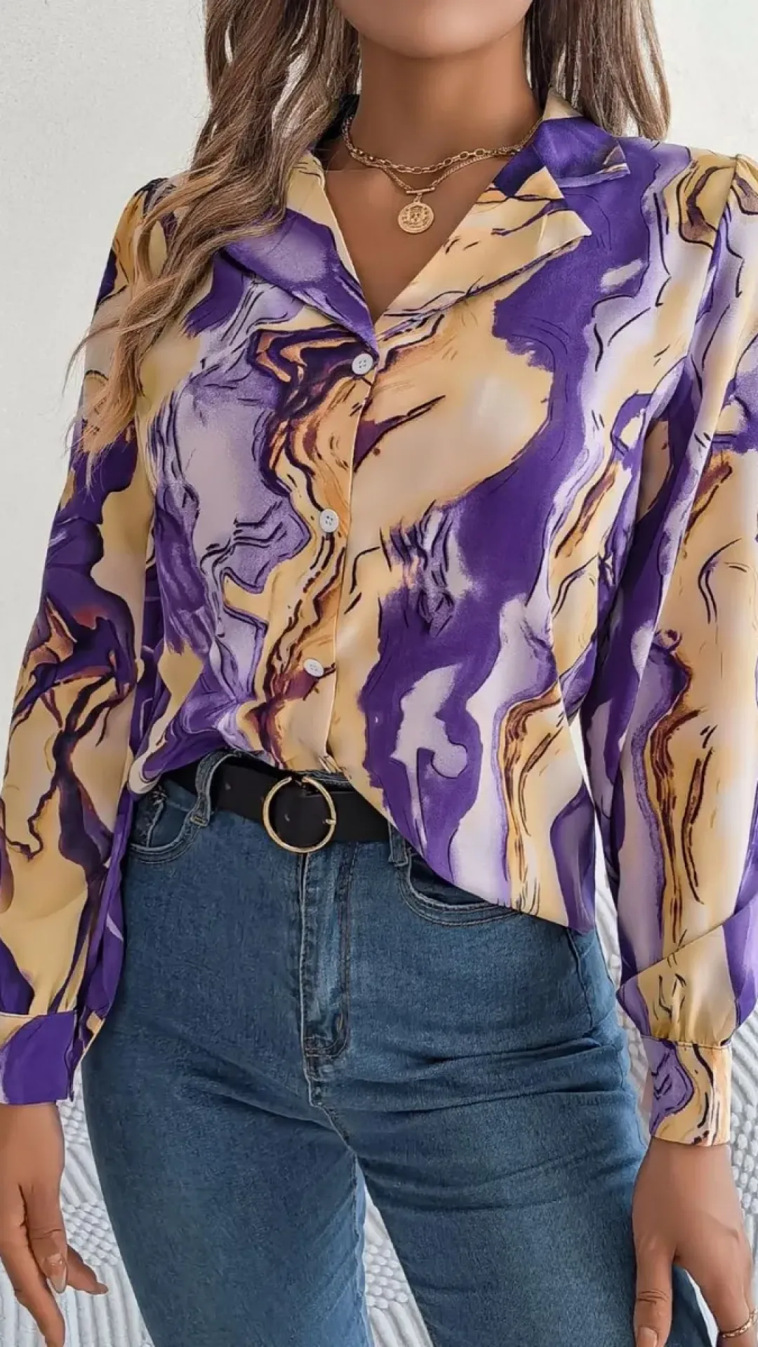 Blusa de manga larga con botones y estampado